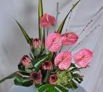 Aranjament masa de 11 anthurium roz